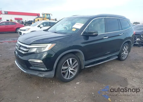 2016 Honda Pilot Touring z USA, uszkodzony, nr VIN 5FNYF6H91GB015643